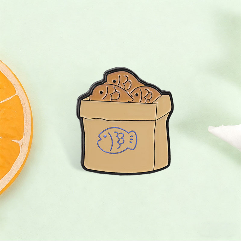 Broche en émail motif poisson  - Tteokbokki Rice Cake avis et prix
